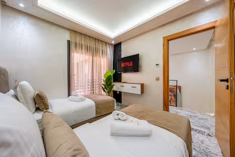 Duplex Moderne 2 Chambres avec Parking Privé au Cœur de Guéliz